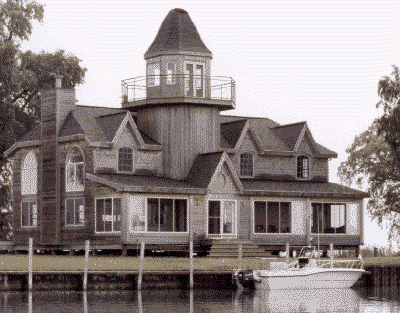 Photo of large cottage with my boat out front